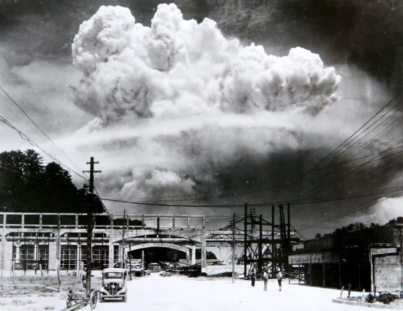 The mushroom cloud billows over the city of Nagasaki on August 9, 1945 (Japanese Government)